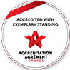 Accreditation Canada Seal: Accredited with Exemplary Standing words with a red star made out of ribbon.