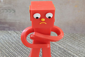 Sad Red Rubber Character.