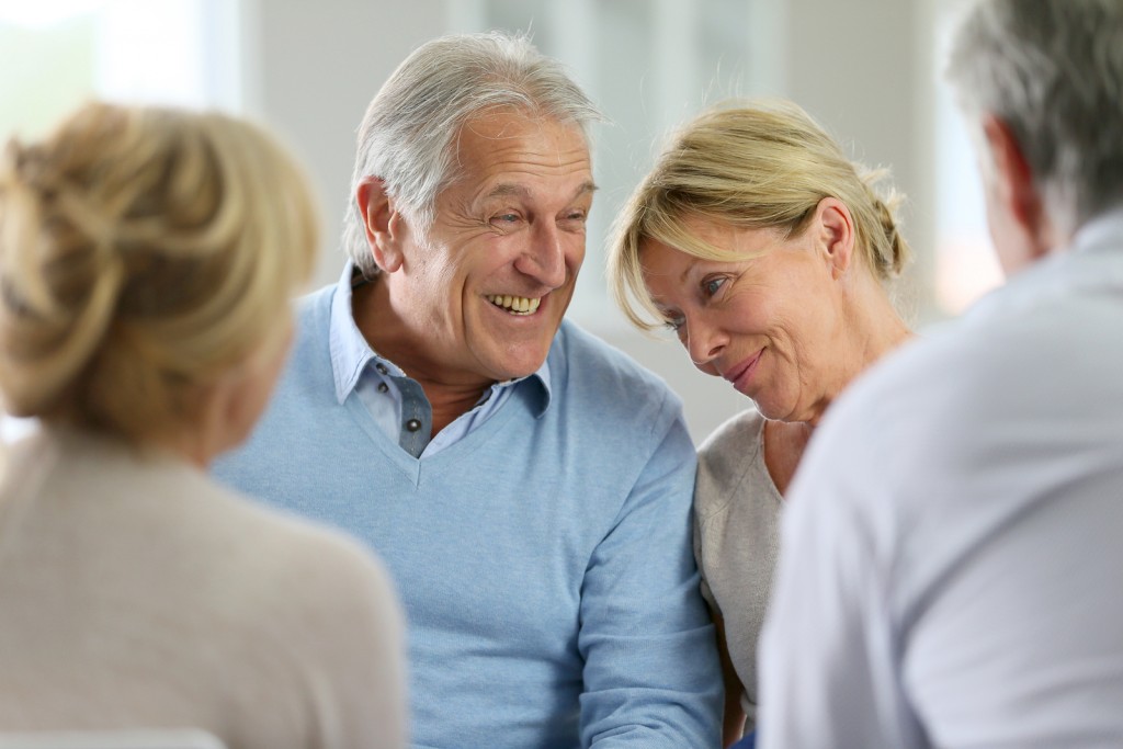 Senior couple attending group therapy.