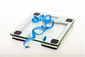Glass Scale With Blue Measuring Tape.