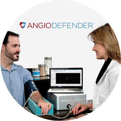 Female doctor giving AngioDefender heart health test to male patient.