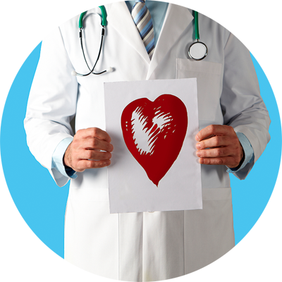Doctor holding a paper that has a red heart.