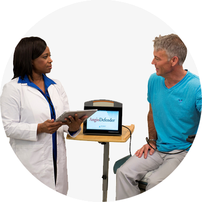 Nurse giving AngioDefender test to male patient.