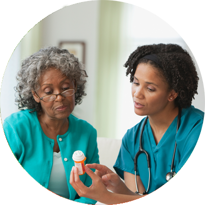 Nurse discussing medication with client.