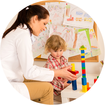 Occupational Therapist working with child.