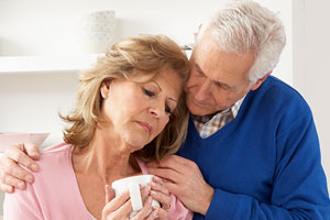 Senior Husband Comforting/supporting Depressed Wife.